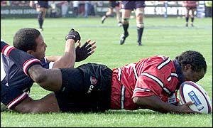 Marcel Garvey eludes Shane Drahm to score