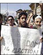 Kashmiri Muslim protesters shout anti-election slogans