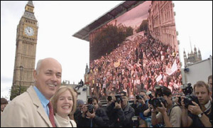 Mr Duncan Smith with his wife Betsy take part in the march
