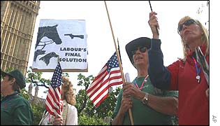 Protesters from the American Fox Hunting Group join the march