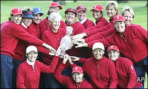 The US team hold the trophy after winning the 2002 Solheim Cup