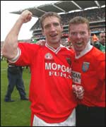 Kieran McGeeney celebrates after the final whistle