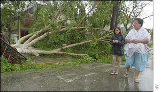 People survey the damage in the Mexican city of Merida