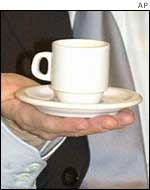 Coffee cup held in hand