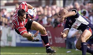 Gloucester's Thinus Delport is sent flying by Brendon Daniel