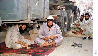 Truck drivers playing cards 