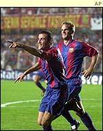 Luis Enrique and Frank de Boer of Barcelona celebrate the former's goal in the 2-0 win over Galatasary