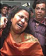 Grieving woman in Karachi Christian attack