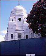 Wembley's Twin Towers behind security hoardings 