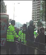 Police marshalling bus queues at Shepherd's Bush