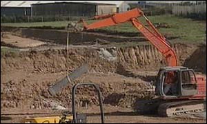 Digger at building site