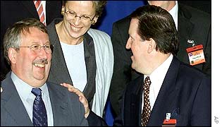 Lord Robertson (r) jokes with Belgian Defence Minister Andre Flahaut and French Defence Minister Michele Alliot-Marie