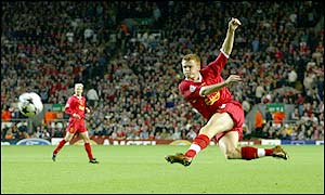 Riise strikes the ball venomously but he is denied by the crossbar