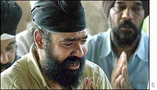 A relative of one of the temple victims