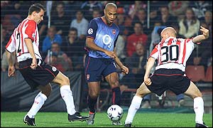 Thierry Henry takes on the PSV Eindhoven defence