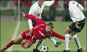 Spartak's Maxim Kalinichenko goes to ground under the challenge of Miguel Angel Angulo (right) and Curro Torres 