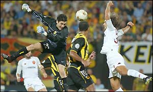 Roma's Gabriel Batistuta (right) goes for a cross