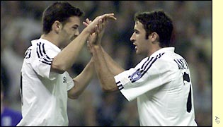 Raul (right) celebrates Madrid's sixth goal with strike partner Fernando Morientes