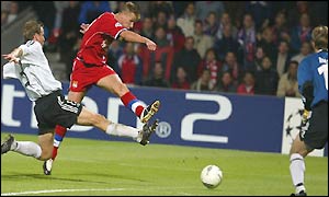 Tony Vairelles fires in a shot before Janne Saarinen can get a block in