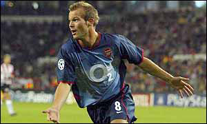 Freddie Ljungberg celebrates after scoring against PSV