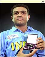 Shewag collects his Man of the Match award