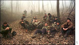 Rebels resting in forest