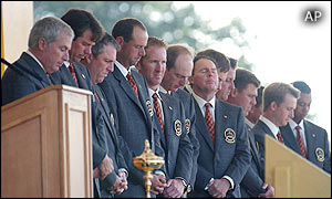 The USA team stand for a silent prayer 