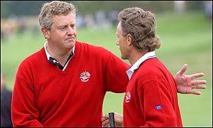 Montgomerie and Langer embrace each other in delight after their win puts Europe into a 3-0 lead