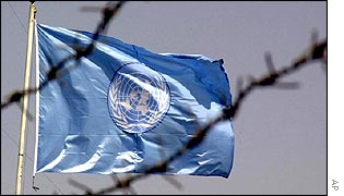 UN flag flies behind barbed wire in the UN compound in Baghdad 
