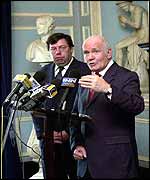 Brian Cowen (L), Northern Ireland Secretary of State John Reid