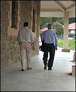 Father Larrinaga with bodyguard