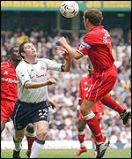 Robbie Keane and Gareth Southgate battle for possession
