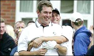 Lee Westwood is congratulated by Sergio Garcia after pulling off a stunning shot at the tenth