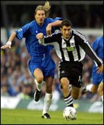 Robbie Savage of Birmingham tries to hold back Andy Griffin