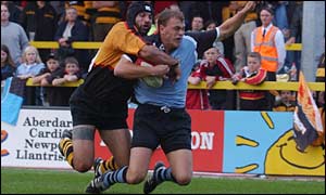 Cardiff wing Craig Morgan scores despite the attentions of Jason Forster