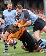 Newport's Steve Ojomoh is brought down