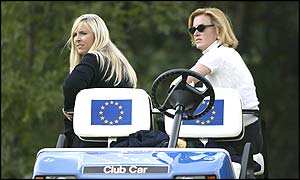 Caroline Harrington and Eimear Montgomerie sit in one of the European team's buggies