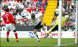 Ruud Van Nistelrooy scores Man Utd's third goal of the game to grab all three points against Charlton