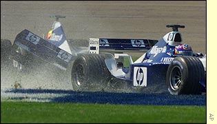 Ralf Schumacher loses his rear wing as Juan Pablo Montoya has to resort to the grass