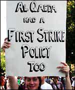 Protester holds anti-first strike sign