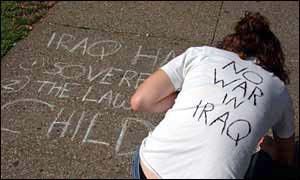 Protester chalks anti-war message