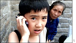 Chinese boy using mobile