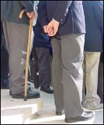 A veteran with a walking stick 