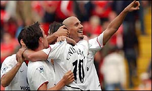 Man Utd players celebrate scoring against Charlton