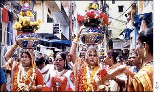 Indian eunuchs taking part in a procession in memory of their dead elders
