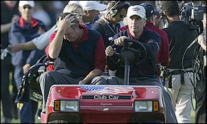 Curtis Strange and Mark Calcavecchia digest the USA's defeat