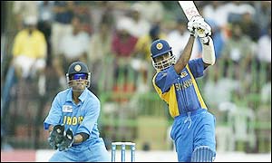 Mahela Jayawardene reaches 77 before being caught off the bowling of Khan