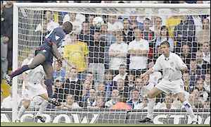 Kolo Toure heads in in Arsenal's win at Leeds