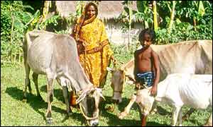 A woman and child in a Bangladeshi village