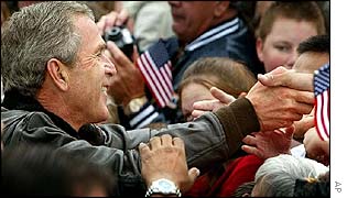 George W Bush greets the crowds
